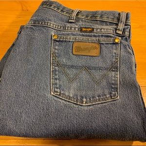 Men’s faded Wrangler jeans